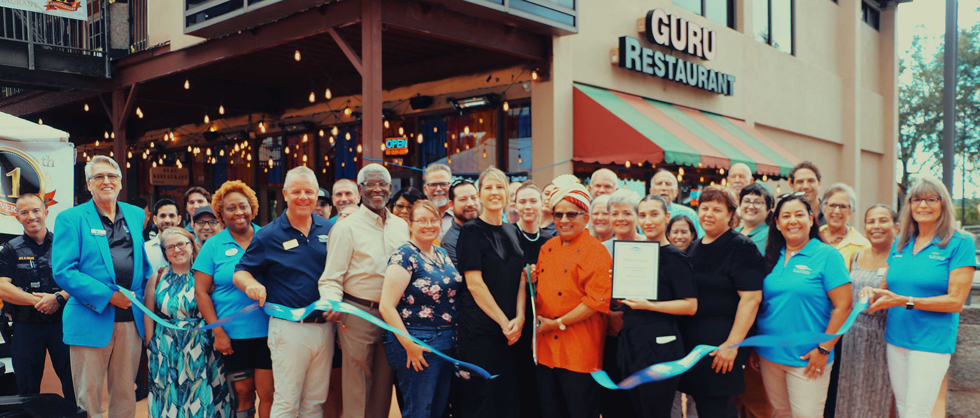 Guru Indian Restaurant getting an award from the city of Clermont